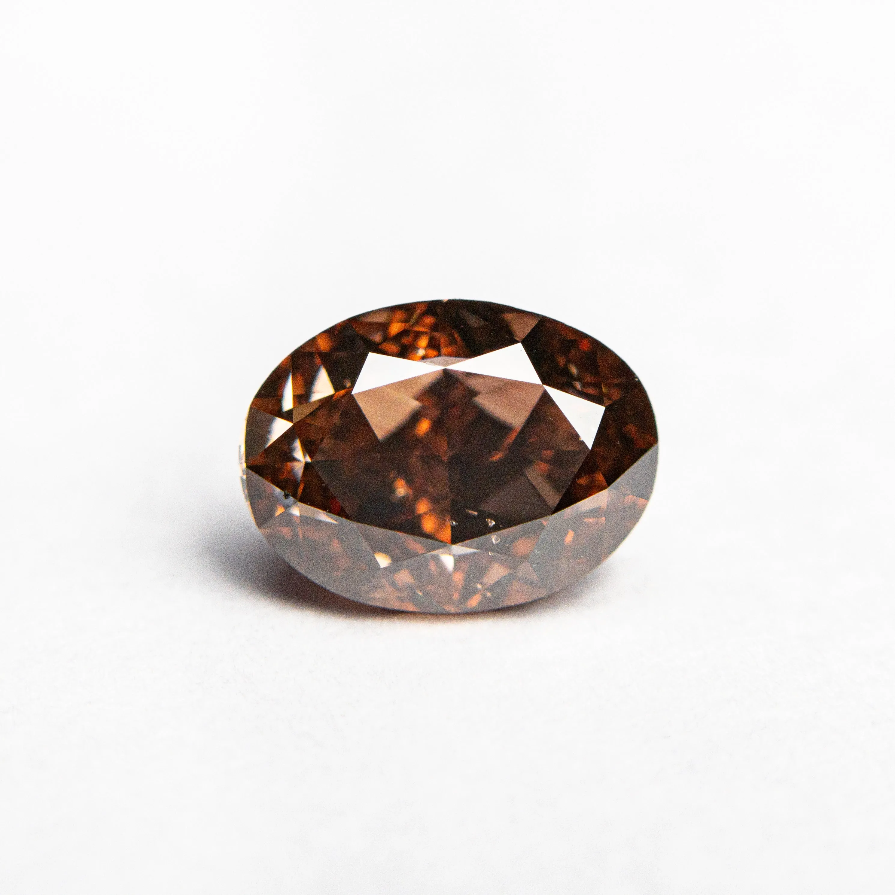 1.50ct 7.69x5.74x4.16mm GIA SI1 Fancy Deep Brown-Pink Oval Brilliant  24161-01