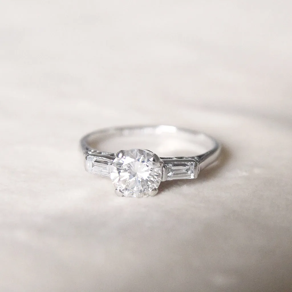 Art Deco 1 Carat Brilliant Cut Diamond Solitaire with Baguette Diamond Shoulders